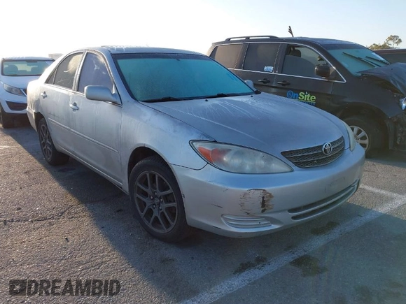 2004 Toyota Camry LE with VIN 4T1BE32K34U307084, listed as a IAAI auction lot 41960265 with 249,222 mi miles. Bid and sale history available at carsss.com. Image 1.