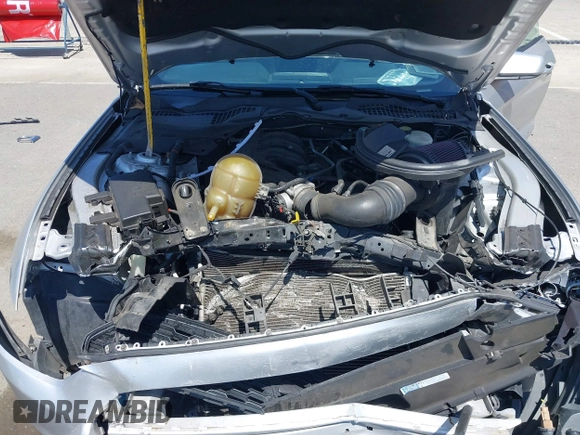 2015 Ford Mustang V6 with VIN 1FATP8EMXF5418893, listed as a IAAI auction lot 42396710 with 103,560 mi miles and . Bid and sale history available at DreamBid. Image 10.