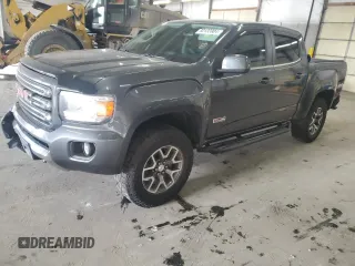 2016 GMC Canyon 4WD SLE z VIN 1GTG6CE34G1223292, wystawiony jako Copart lot #80133904 z przebiegiem 114 662 mil mil oraz Szkody całkowita. Historia ofert i sprzedaży dostępna na DreamBid. Obrazek 1.