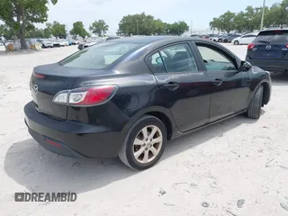 2011 Mazda Mazda3 i Touring with VIN JM1BL1VFXB1472772, listed as a IAAI auction lot 42180030 with 128,438 mi miles. Bid and sale history available at carsss.com. Image 4.