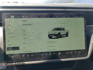2023 Rivian R1T Adventure with VIN 7FCTGBAA8PN027711, listed as a Copart auction lot 49449155 with 16,031 mi miles and Salvage Title. Bid and sale history available at carsss.com. Image 9.