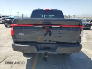 2022 Ford F-150 Lightning Pro z VIN 1FT6W1EV8NWG04113, wystawiony jako Copart lot #57489635 z przebiegiem 48 990 mil mil oraz Szkody całkowita. Historia ofert i sprzedaży dostępna na DreamBid. Obrazek 6.
