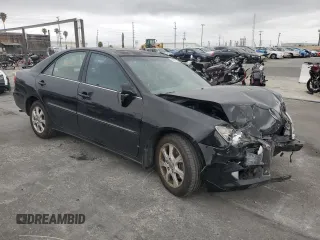 2005 Toyota Camry LE with VIN 4T1BF32K45U102615, listed as a Copart auction lot 56182705 with 196,300 mi miles and Salvage Title. Bid and sale history available at DreamBid. Image 4.