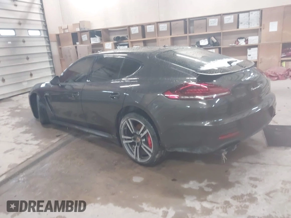 2014 Porsche Panamera GTS with VIN WP0AF2A73EL083133, listed as a IAAI auction lot 41945656 with 75,701 mi miles and . Bid and sale history available at DreamBid. Image 3.