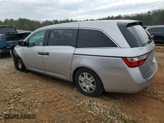 2012 Honda Odyssey LX with VIN 5FNRL5H26CB019627, listed as a Copart auction lot 87094684 with 214,563 mi miles and Salvage Title. Bid and sale history available at carsss.com. Image 2.