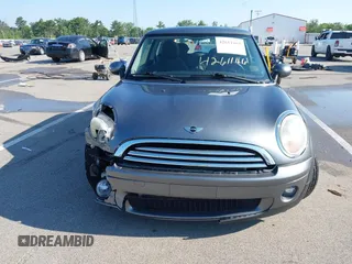 2010 MINI Hardtop with VIN WMWMF3C51ATZ61146, listed as a IAAI auction lot 42611461 with 96,038 mi miles and . Bid and sale history available at DreamBid. Image 11.