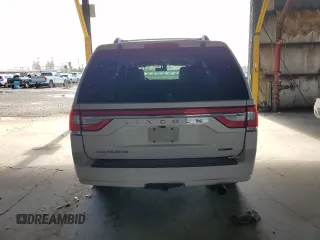2015 Lincoln Navigator z VIN 5LMJJ2HT1FEJ07011, wystawiony jako Copart lot #59206875 z przebiegiem 251 474 mil mil oraz Czysty tytuł • Clean title. Historia ofert i sprzedaży dostępna na DreamBid. Obrazek 6.