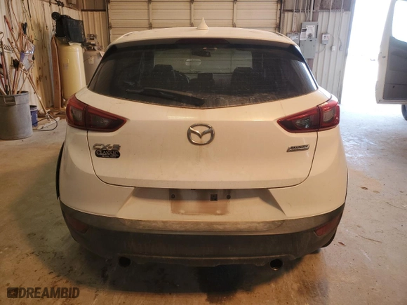 2016 Mazda CX-3 Touring with VIN JM1DKDC72G0139892, listed as a Copart auction lot 45292075 with 130,524 mi miles and Salvage Title. Bid and sale history available at carsss.com. Image 6.