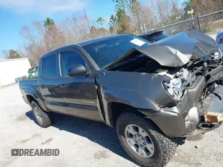 2014 Toyota Tacoma with VIN 5TFLU4EN4EX107161, listed as a IAAI auction lot 41411872 with 134,273 mi miles. Bid and sale history available at carsss.com. Image 13.