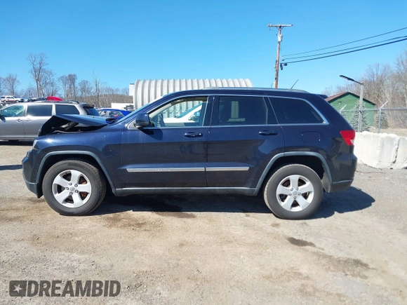 2011 Jeep Grand Cherokee Laredo with VIN 1J4RR4GG3BC670712, listed as a IAAI auction lot 41738127 with 93,714 mi miles and . Bid and sale history available at DreamBid. Image 14.