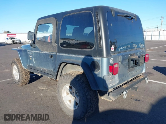 1998 Jeep Wrangler Sport with VIN 1J4FY19S4WP716469, listed as a IAAI auction lot 41506513 with 142,289 mi miles. Bid and sale history available at carsss.com. Image 3.