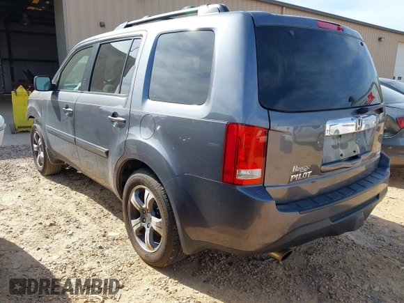 2015 Honda Pilot SE with VIN 5FNYF4H30FB076934, listed as a IAAI auction lot 41810621 with 203,871 mi miles and . Bid and sale history available at DreamBid. Image 3.