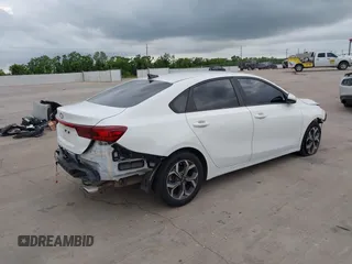 2021 Kia Forte LXS with VIN 3KPF24AD0ME361786, listed as a IAAI auction lot 42427196 with 60,013 mi miles and . Bid and sale history available at DreamBid. Image 4.