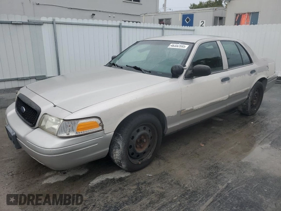 2011 Ford Police Interceptor with VIN 2FABP7BVXBX123711, listed as a Copart auction lot 46352595 with 151,597 mi miles and Clean title. Bid and sale history available at DreamBid. Image 1.