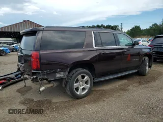 2020 Chevrolet Suburban LS z VIN 1GNSCGKC7LR218296, wystawiony jako Copart lot #61767105 z przebiegiem 118 405 mil mil oraz Szkoda całkowita • Salvage title. Historia ofert i sprzedaży dostępna na DreamBid. Obrazek 3.