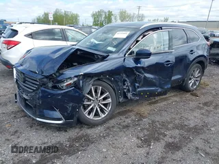 2021 Mazda CX-9 Grand Touring with VIN JM3TCBDY3M0537975, listed as a IAAI auction lot 42251894 with 50,156 mi miles and . Bid and sale history available at DreamBid. Image 2.