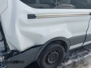 2018 Ford Transit Passenger XL z VIN 1FBZX2CMXJKA07321, wystawiony jako IAAI lot #41373858 z przebiegiem 197 135 mil mil oraz . Historia ofert i sprzedaży dostępna na DreamBid. Obrazek 6.