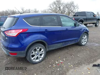 2013 Ford Escape SEL with VIN 1FMCU9H92DUA47288, listed as a IAAI auction lot 41912588 with 165,728 mi miles. Bid and sale history available at carsss.com. Image 4.