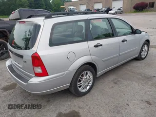 2003 Ford Focus SE Fleet z VIN 1FAFP36323W191551, wystawiony jako IAAI lot #42498013 z przebiegiem 142 724 mil mil oraz . Historia ofert i sprzedaży dostępna na DreamBid. Obrazek 4.