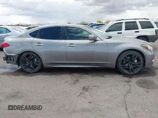 2012 Infiniti M with VIN JN1BY1AP3CM332453, listed as a IAAI auction lot 41944895 with 176,989 mi miles and . Bid and sale history available at DreamBid. Image 14.