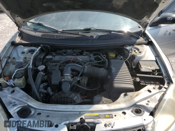 2006 Dodge Stratus SXT z VIN 1B3EL46XX6N123648, wystawiony jako Copart lot #67670914 z przebiegiem 118 573 mil mil oraz Szkoda całkowita • Salvage title. Historia ofert i sprzedaży dostępna na DreamBid. Obrazek 11.