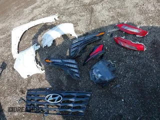 2022 Hyundai Tucson SE z VIN 5NMJACAE3NH012650, wystawiony jako IAAI lot #42137835 z przebiegiem 107 599 mil mil oraz . Historia ofert i sprzedaży dostępna na DreamBid. Obrazek 12.