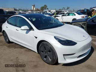 2023 Tesla Model 3 z VIN 5YJ3E1EA5PF401237, wystawiony jako IAAI lot #42520423 z przebiegiem 45 262 mil mil oraz . Historia ofert i sprzedaży dostępna na DreamBid. Obrazek 1.