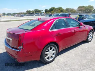 2009 Cadillac CTS RWD w/1SA with VIN 1G6DF577290142964, listed as a IAAI auction lot 42017475 with 171,696 mi miles. Bid and sale history available at carsss.com. Image 4.