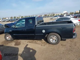1998 Ford F-150 XL with VIN 1FTRX17L9WNA67717, listed as a IAAI auction lot 41604900 with 133,457 mi miles and . Bid and sale history available at DreamBid. Image 15.