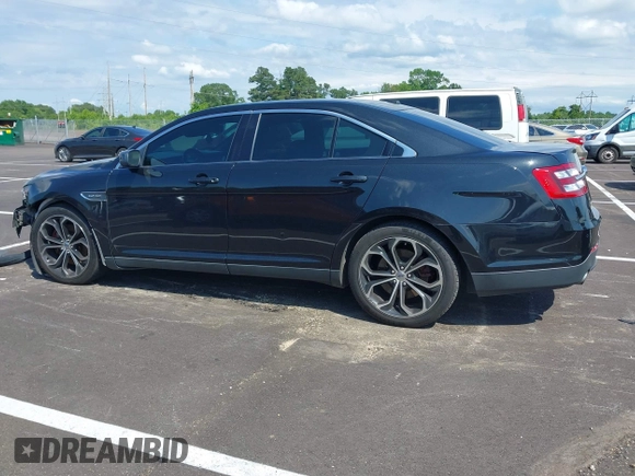 2013 Ford Taurus SHO z VIN 1FAHP2KT1DG135962, wystawiony jako IAAI lot #42449604 z przebiegiem 138 921 mil mil oraz . Historia ofert i sprzedaży dostępna na DreamBid. Obrazek 14.