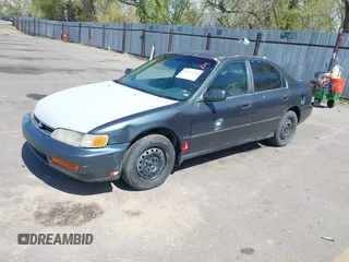 1997 Honda Accord LX with VIN JHMCD5639VC020185, listed as a IAAI auction lot 42072191 with 263,967 mi miles and . Bid and sale history available at carsss.com. Image 2.
