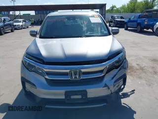 2020 Honda Pilot EX-L with VIN 5FNYF5H46LB004744, listed as a IAAI auction lot 42095298 with 76,159 mi miles and . Bid and sale history available at DreamBid. Image 11.