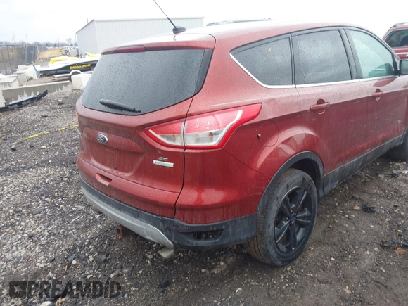 2015 Ford Escape SE with VIN 1FMCU0GXXFUA60756, listed as a IAAI auction lot 41709026 with 161,924 mi miles. Bid and sale history available at carsss.com. Image 4.