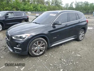 2017 BMW X1 xDrive28i with VIN WBXHT3Z35H4A65798, listed as a Copart auction lot 55812525 with 96,802 mi miles and Salvage title. Bid and sale history available at DreamBid. Image 1.