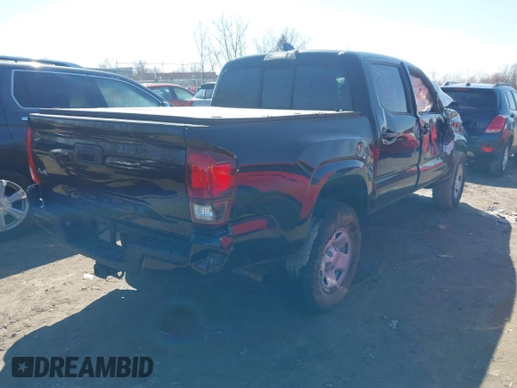 2023 Toyota Tacoma SR with VIN 3TMCZ5AN9PM555191, listed as a IAAI auction lot 41935645 with 31,580 mi miles and . Bid and sale history available at DreamBid. Image 4.