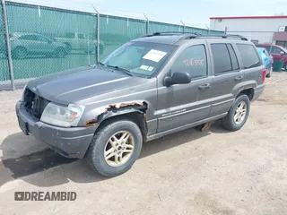 2004 Jeep Grand Cherokee Laredo z VIN 1J4GW48S34C399804, wystawiony jako IAAI lot #42163326 z przebiegiem 203 278 mil mil oraz . Historia ofert i sprzedaży dostępna na DreamBid. Obrazek 2.