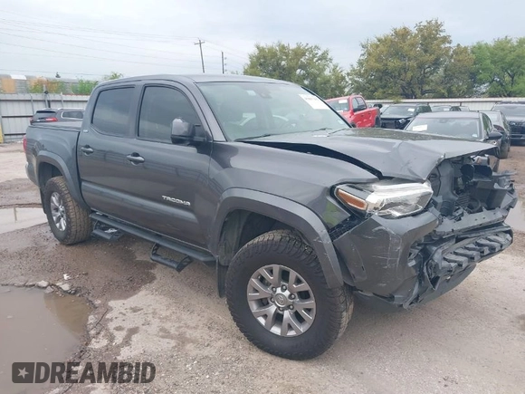 2018 Toyota Tacoma SR5 with VIN 5TFAZ5CN5JX062498, listed as a IAAI auction lot 41867393 with 128,879 mi miles and . Bid and sale history available at DreamBid. Image 1.