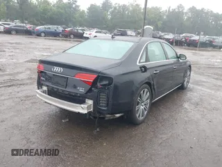 2015 Audi A8 4.0T with VIN WAU32AFD2FN026356, listed as a IAAI auction lot 42330082 with 44,857 mi miles and . Bid and sale history available at DreamBid. Image 4.