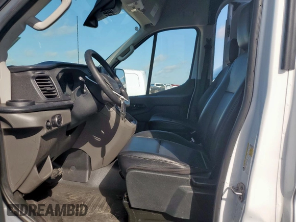 2023 Ford Transit Cargo with VIN 1FTRU8XGXPKC05787, listed as a Copart auction lot 59768665 with 24,845 mi miles and Salvage title. Bid and sale history available at DreamBid. Image 7.