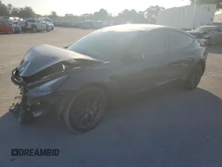 2023 Tesla Model 3 with VIN 5YJ3E1EA1PF558134, listed as a Copart auction lot 57133275 with 25,385 mi miles and Salvage title. Bid and sale history available at DreamBid. Image 1.