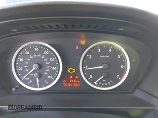 2005 BMW 5 Series 545i with VIN WBANB33565CN65705, listed as a IAAI auction lot 41681847 with 112,159 mi miles and . Bid and sale history available at carsss.com. Image 7.