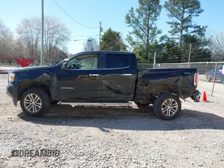 2015 GMC Canyon 2WD SLT with VIN 1GTG5CE35F1249224, listed as a IAAI auction lot 41697796 with 180,230 mi miles. Bid and sale history available at carsss.com. Image 14.