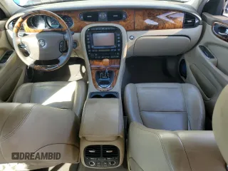 2005 Jaguar XJ with VIN SAJWA79C35SG48607, listed as a Copart auction lot 77132444 with 159,051 mi miles and Salvage Title. Bid and sale history available at carsss.com. Image 8.