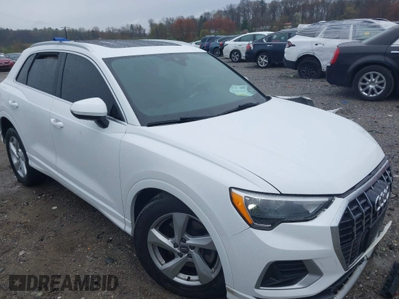2020 Audi Q3 Premium with VIN WA1AECF35L1030273, listed as a IAAI auction lot 42006553 with 81,944 mi miles. Bid and sale history available at carsss.com. Image 1.