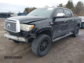 2012 Toyota Tundra 4WD Truck LTD with VIN 5TFHW5F19CX218772, listed as a IAAI auction lot 41472955 with 134,928 mi miles. Bid and sale history available at carsss.com. Image 2.