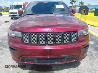 2017 Jeep Grand Cherokee Laredo with VIN 1C4RJFAG3HC701869, listed as a IAAI auction lot 42720101 with 67,311 mi miles and . Bid and sale history available at DreamBid. Image 6.