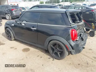 2019 MINI Hardtop Cooper S z VIN WMWXP7C56K2A49415, wystawiony jako IAAI lot #41952188 z przebiegiem 143 633 mil mil oraz . Historia ofert i sprzedaży dostępna na DreamBid. Obrazek 3.