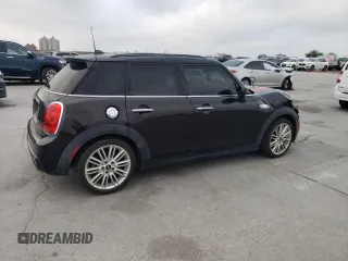 2015 MINI Hardtop 4 Door S z VIN WMWXU3C5XF2B56104, wystawiony jako Copart lot #51189075 z przebiegiem 113 586 mil mil oraz Szkoda całkowita • Salvage title. Historia ofert i sprzedaży dostępna na DreamBid. Obrazek 3.