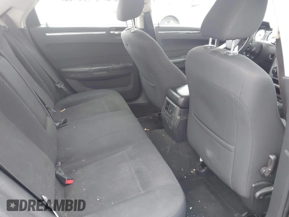 2009 Chrysler 300 LX with VIN 2C3KA43D19H506753, listed as a IAAI auction lot 42053199 with 106,092 mi miles. Bid and sale history available at carsss.com. Image 8.