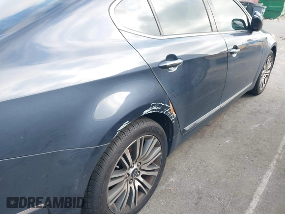 2015 Kia Cadenza Premium z VIN KNALN4D75F5174460, wystawiony jako IAAI lot #42521576 z przebiegiem 172 375 mil mil oraz . Historia ofert i sprzedaży dostępna na DreamBid. Obrazek 6.